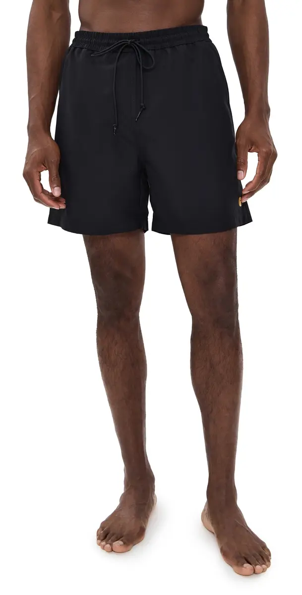 CARHARTT WIP — Chase Swim Trunks, Black/Gold · $88