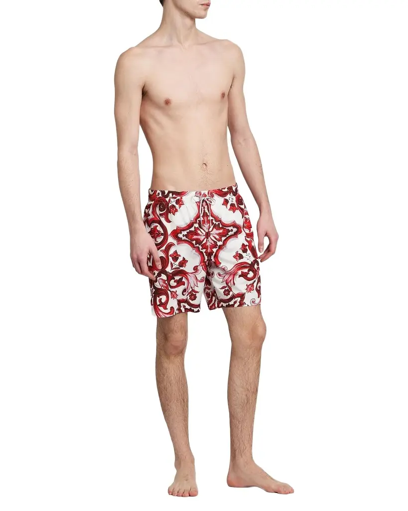 DOLCE & GABBANA — Majolica-Print Swim Trunks · $825